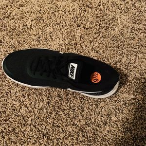 Women’s black, gray and white Nike sneakers